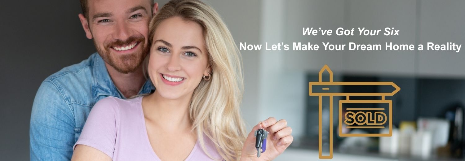 Couple smiling and holding house keys, with a "SOLD" sign in the background, representing successful home purchase for law enforcement professionals.